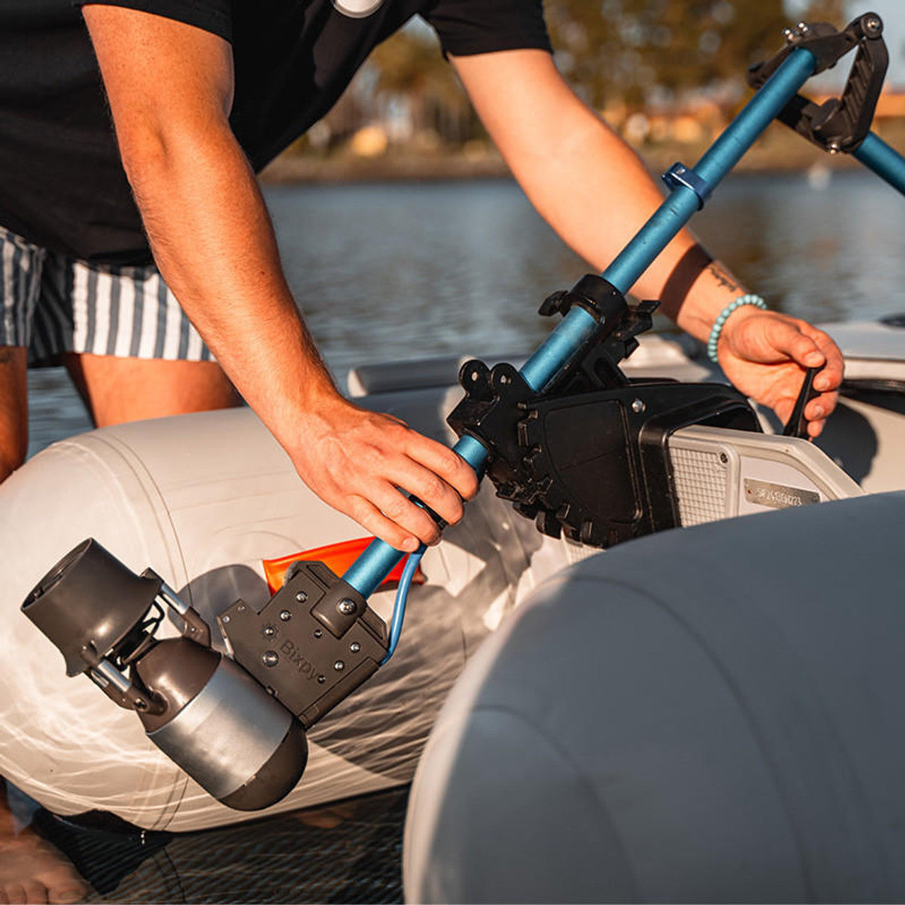 Bixpy K-1 motor mounted on a RIB with the transom mount adapter