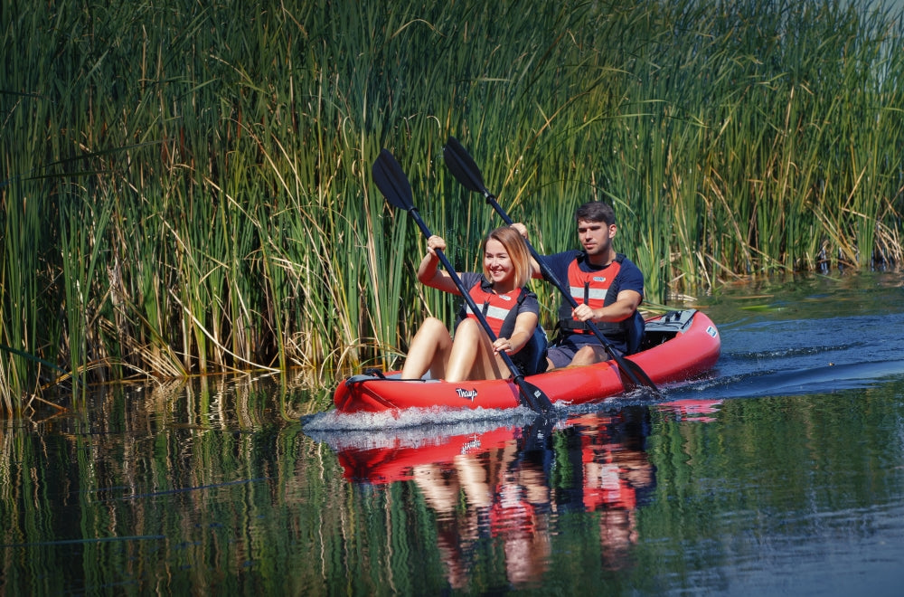 Gumotex Thaya Tandem kayak paddling on a gentle river