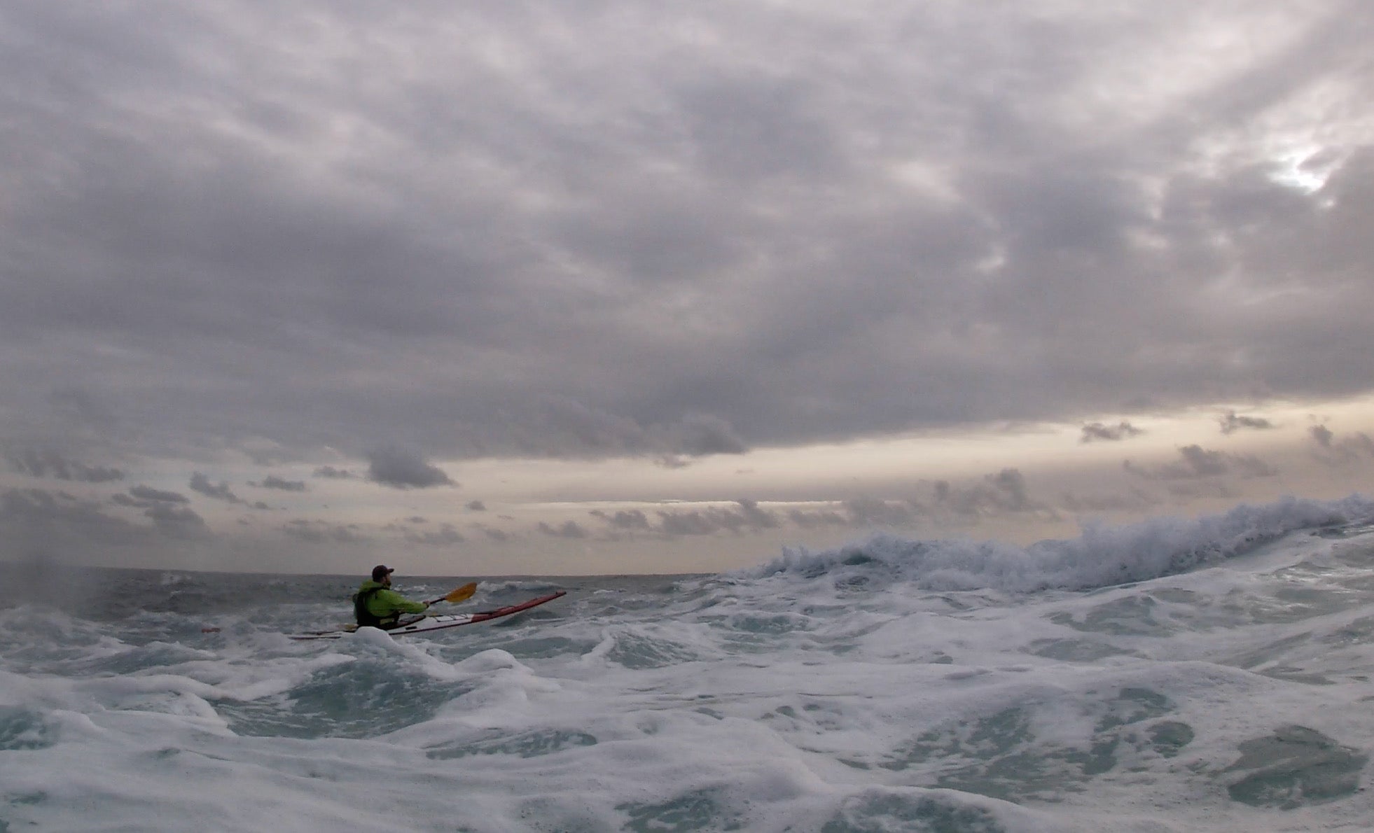 Staff Member Andrew using the power of the Corryvreckan 220 paddles off Gribbin Head