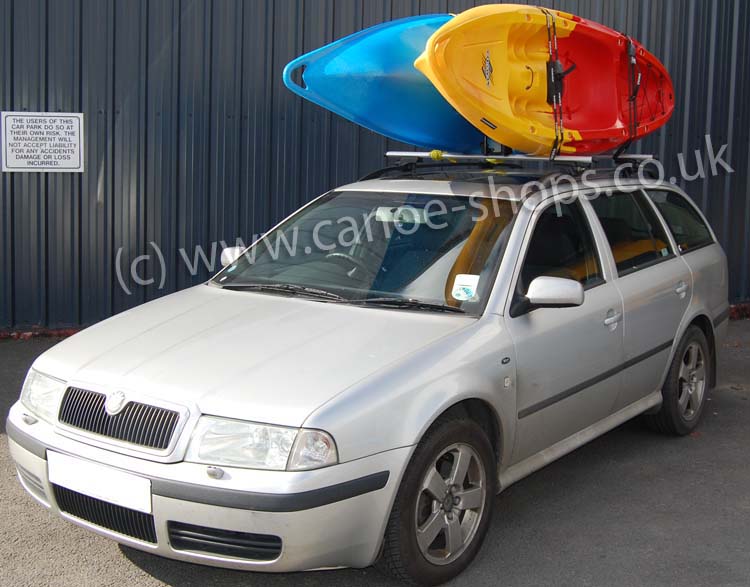 Thule Kayak Stacker with two kayaks on a Thule Roof Rack system